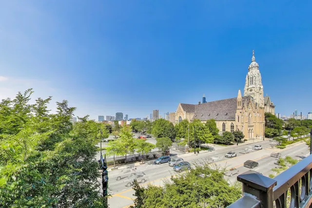 a view of a city with tall buildings