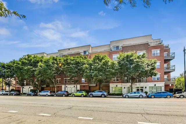 front view of a building with a street