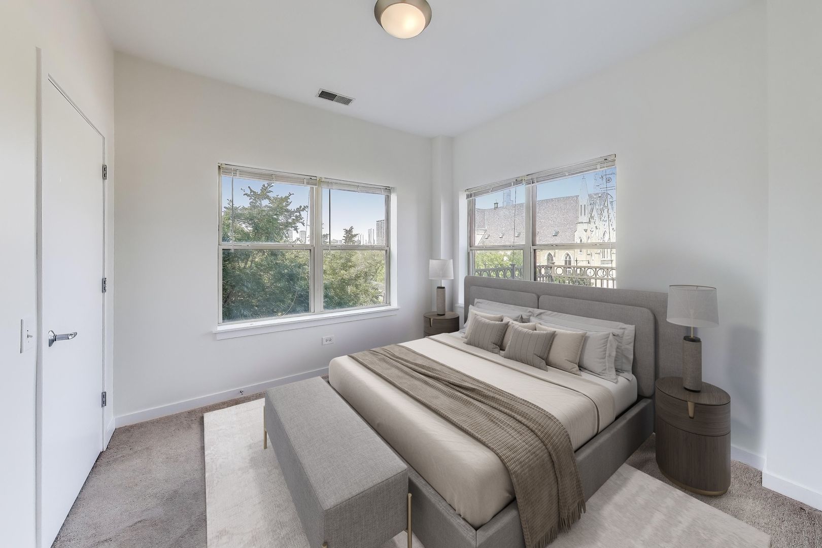 1155 West Roosevelt Road, Unit 412 Chicago, IL 60608 - Photo 24 of 31 a bedroom with a bed and a window