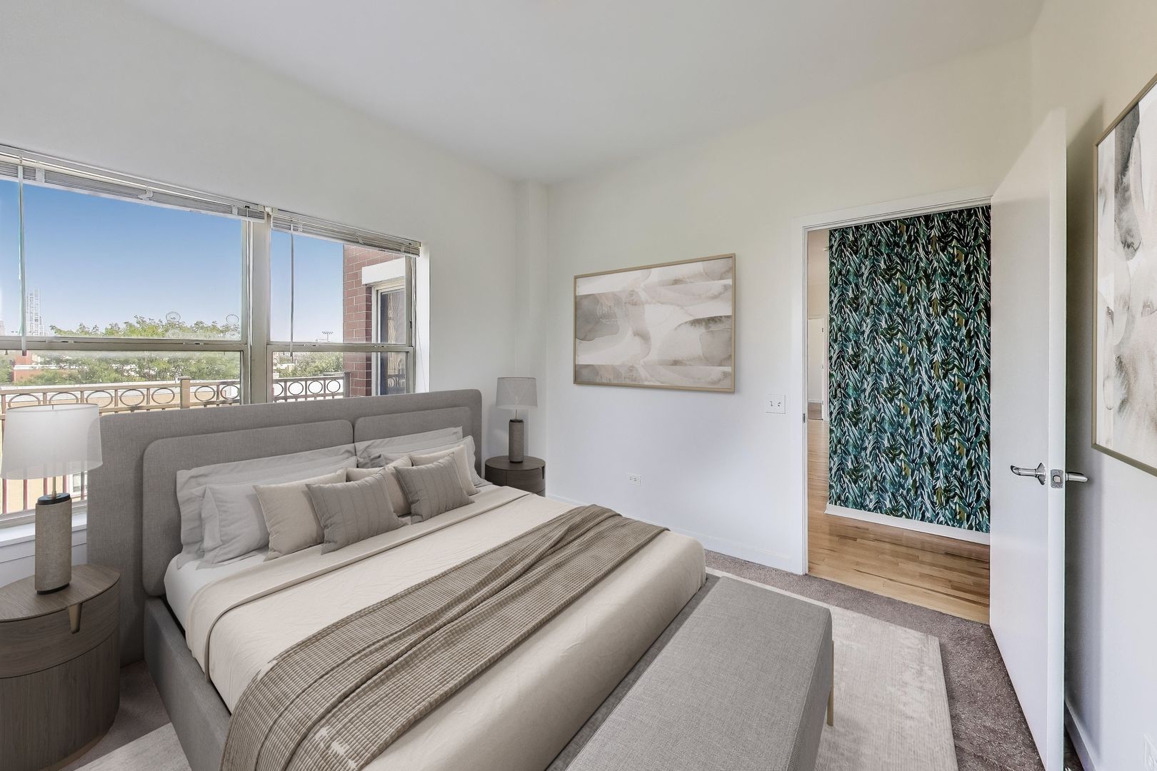 1155 West Roosevelt Road, Unit 412 Chicago, IL 60608 - Photo 25 of 31 a bedroom with a bed and window