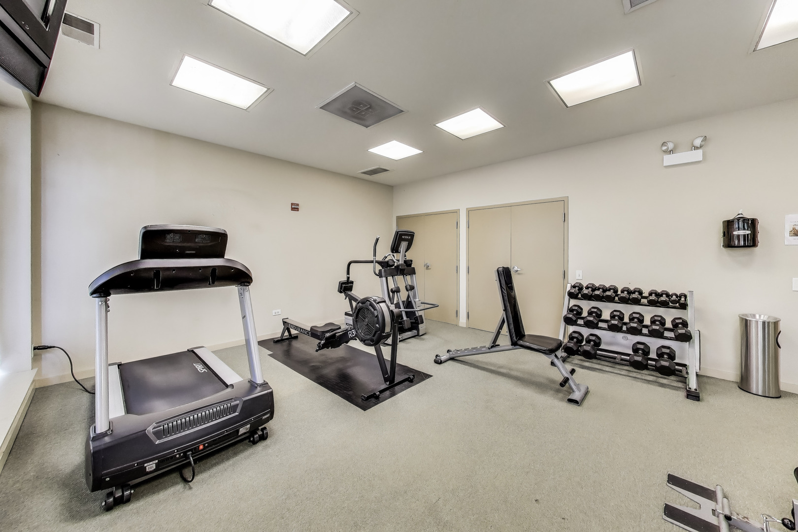 1155 West Roosevelt Road, Unit 412 Chicago, IL 60608 - Photo 29 of 31 a view of a room with gym equipment