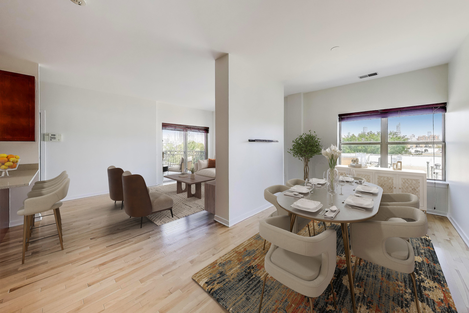 1155 West Roosevelt Road, Unit 412 Chicago, IL 60608 - Photo 7 of 31 a view of a dining room with furniture and wooden floor