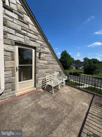 a view of a chair with a small yard