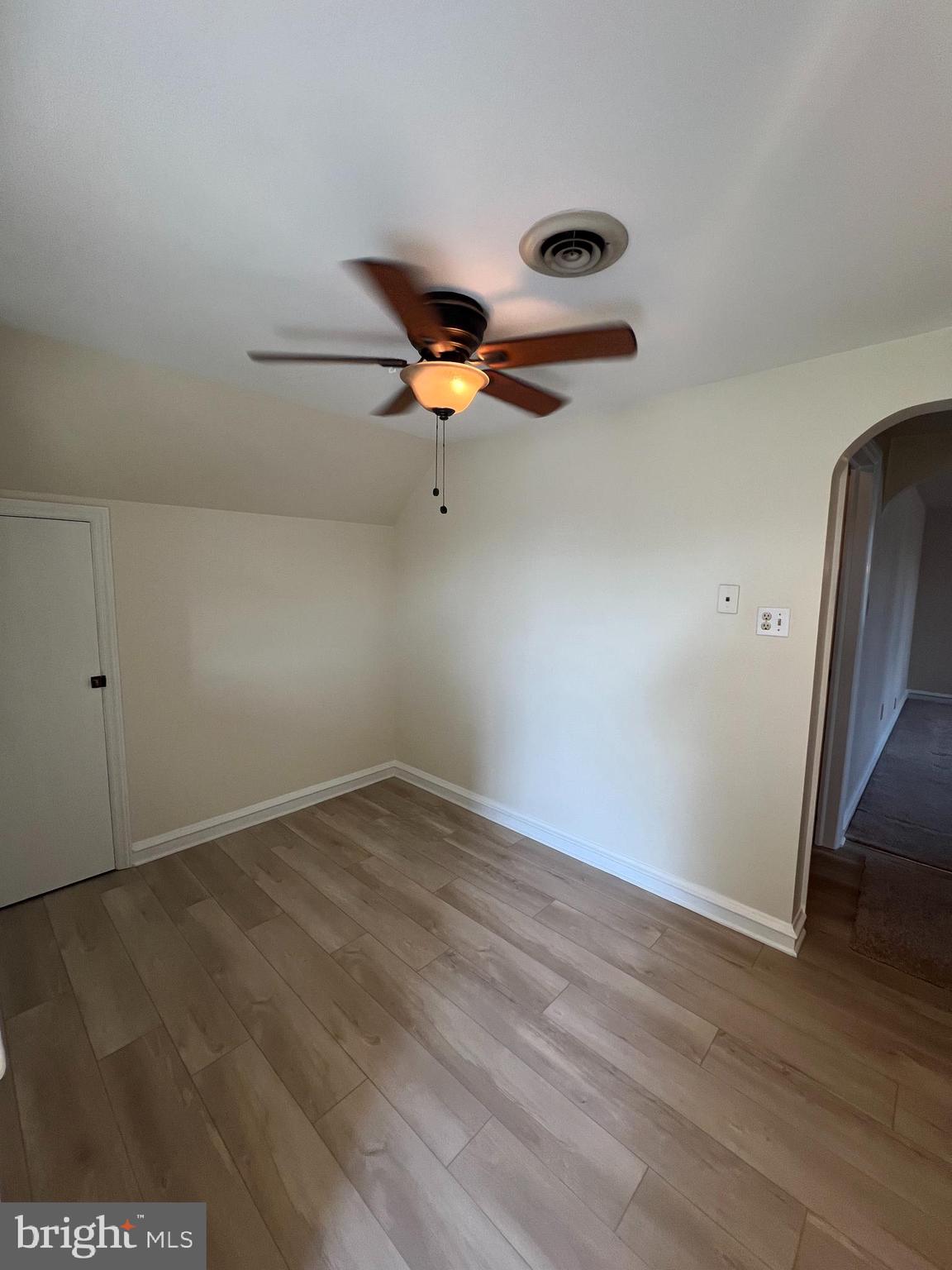 415 East Main Street, Unit A Maple Shade, NJ 08052 - Photo 29 of 41 an empty room with wooden floor air conditioner and windows