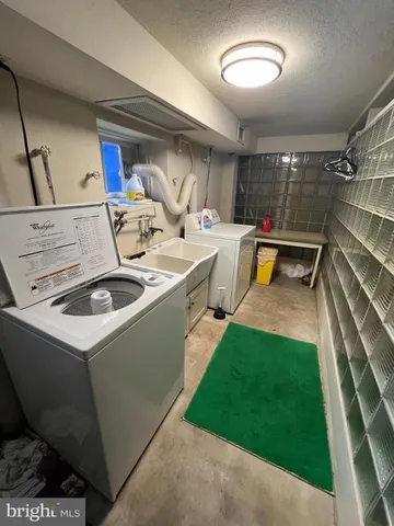 a storage room with washer and dryer