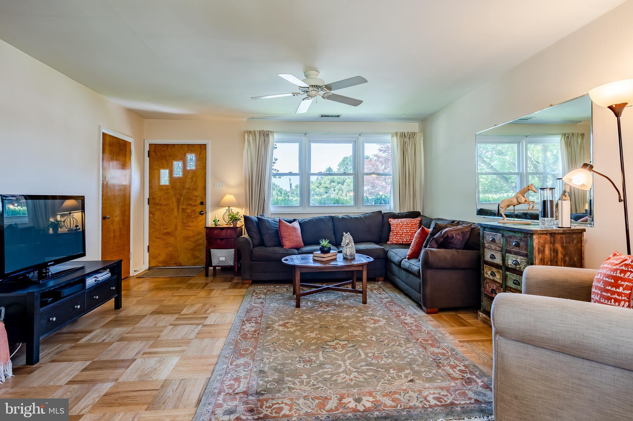 102 Pine Tree Road Paoli, PA 19301 - Photo 4 of 33 Living room with ceiling fan
