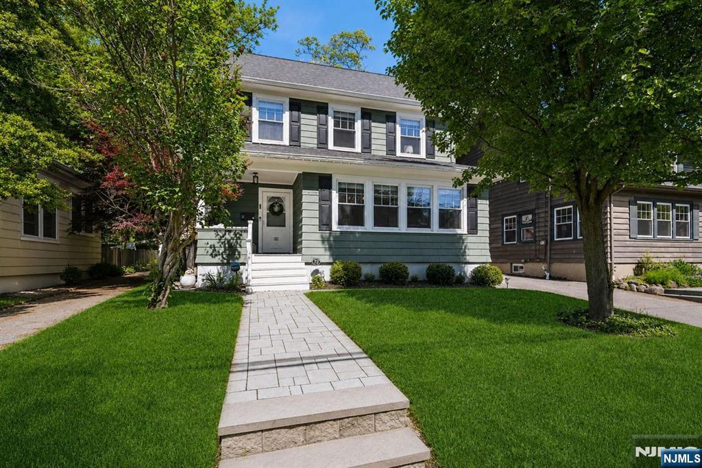 72 Central Avenue Montclair, NJ 07042 - Photo 1 of 36 a front view of a house with a yard