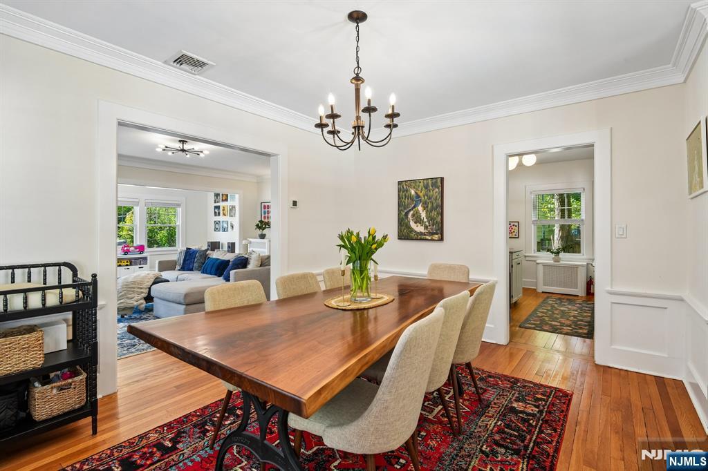 72 Central Avenue Montclair, NJ 07042 - Photo 11 of 36 a view of a dining room with furniture and wooden floor