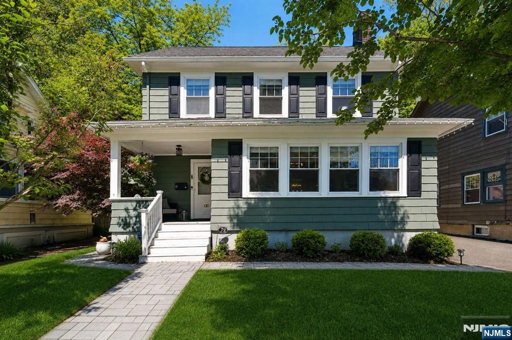 72 Central Avenue Montclair, NJ 07042 - Photo 2 of 36 a front view of a house with a yard