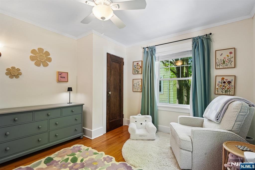 72 Central Avenue Montclair, NJ 07042 - Photo 22 of 36 a living room with furniture and a window