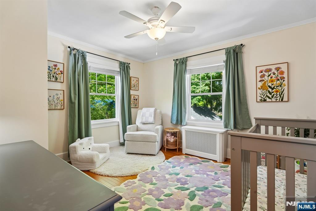 72 Central Avenue Montclair, NJ 07042 - Photo 23 of 36 a living room with furniture and a large window