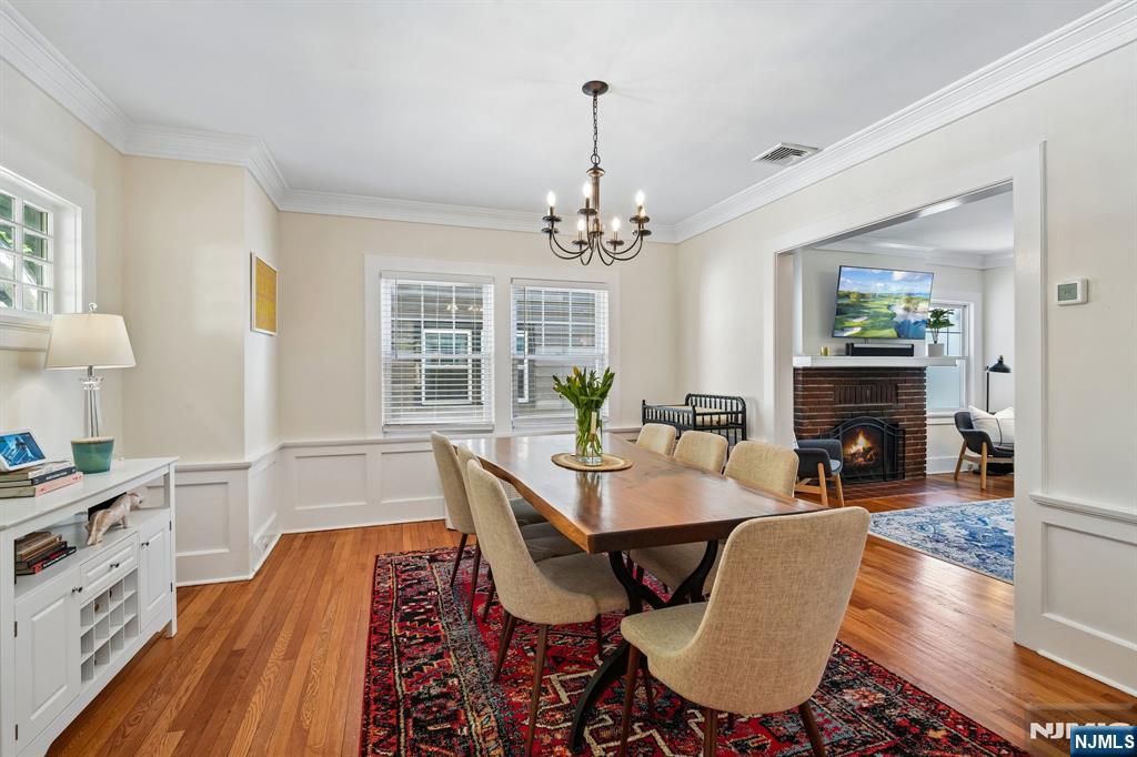 72 Central Avenue Montclair, NJ 07042 - Photo 10 of 36 a view of a dining room with furniture window and wooden floor