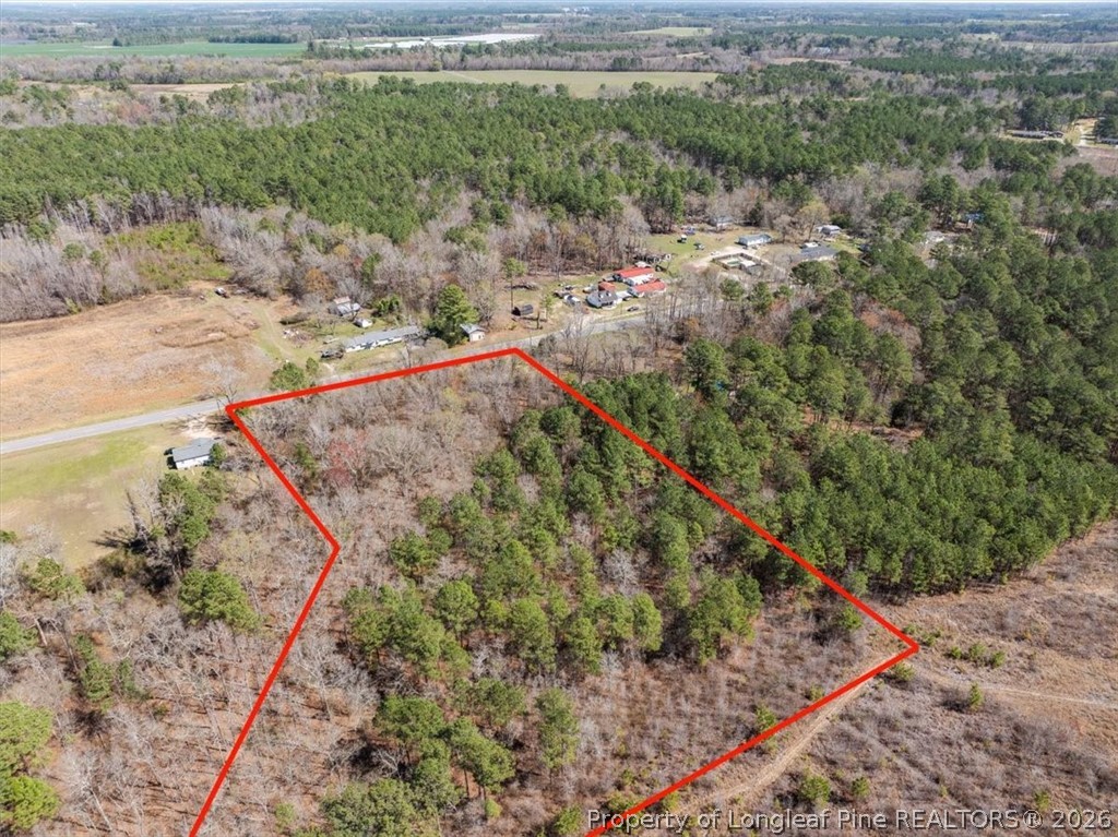 532 North Shannon Road Red Springs, NC 28377 - Photo 4 of 16 a view of a yard with wooden fence