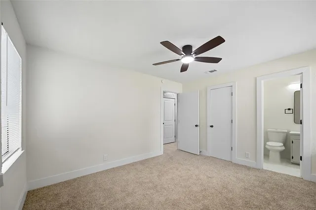 a view of a livingroom with a bathroom