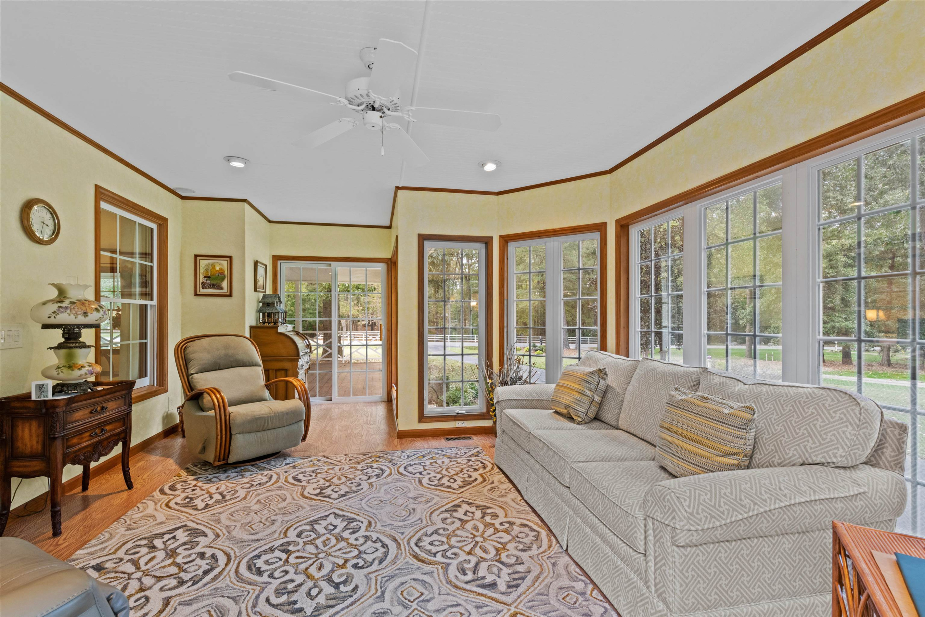 8417 Crowder Road Raleigh, NC 27603 - Photo 12 of 30 Sunroom is not permitted, it was on the house when purchased. Seller's enclosed with glass in 2015. It is heated and cooled. Sunroom
