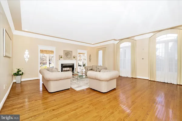 a large kitchen with stainless steel appliances granite countertop a stove a sink and a refrigerator
