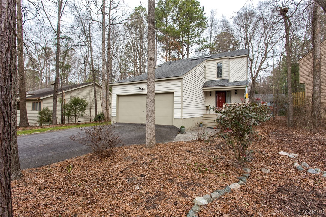14208 Regatta Pointe Road Midlothian, VA 23112 - Photo 2 of 35 a view of a house with a yard and large tree