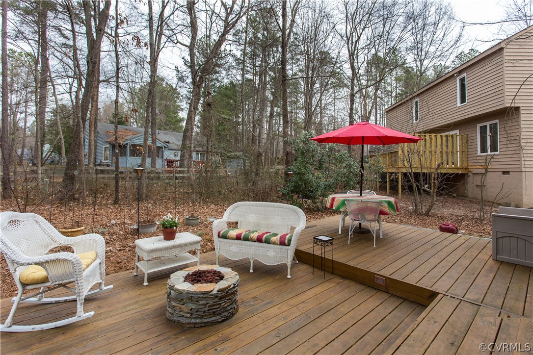 14208 Regatta Pointe Road Midlothian, VA 23112 - Photo 29 of 35 a view of a patio with furniture and a table