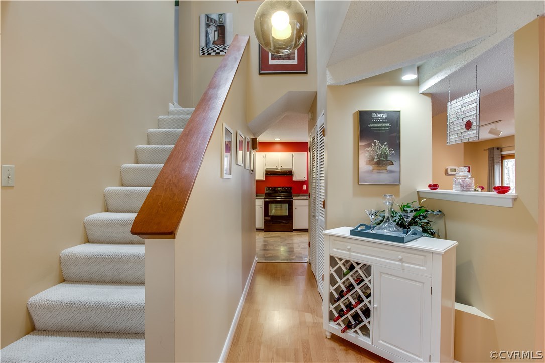 14208 Regatta Pointe Road Midlothian, VA 23112 - Photo 6 of 35 a living room with furniture and stairs