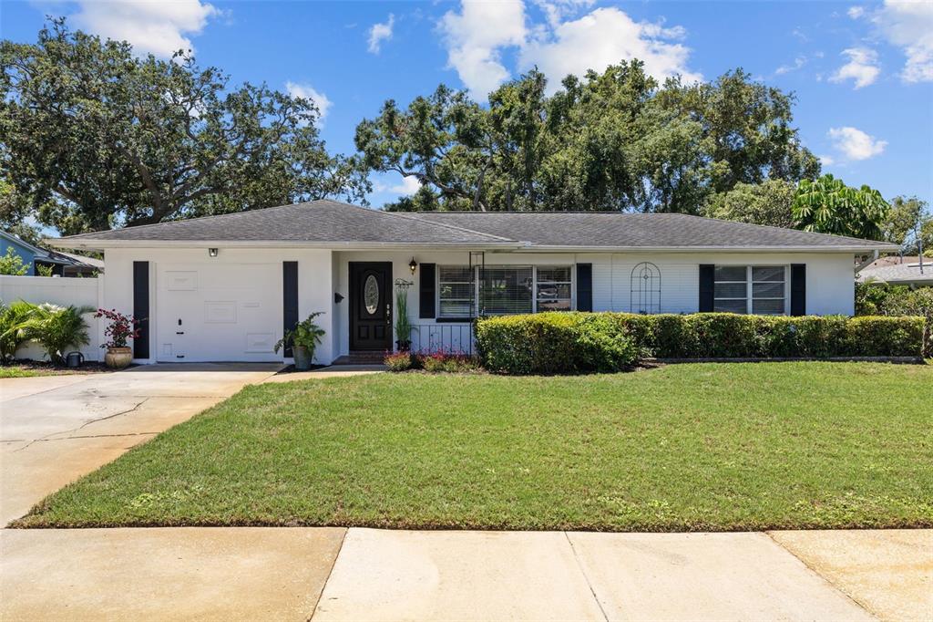 403 Althea Road Belleair, FL 33756 - Photo 1 of 1 a house view with a garden space