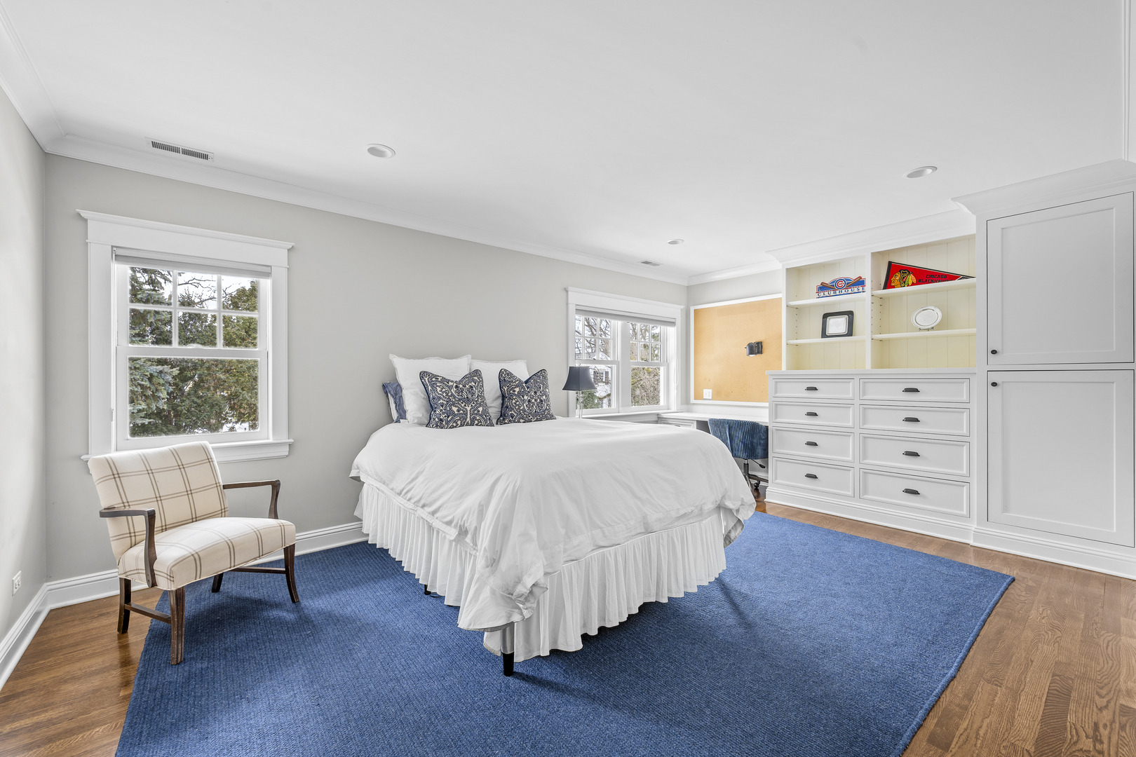 140 Birch Street Winnetka, IL 60093 - Photo 51 of 78 a bedroom with a bed and a dresser