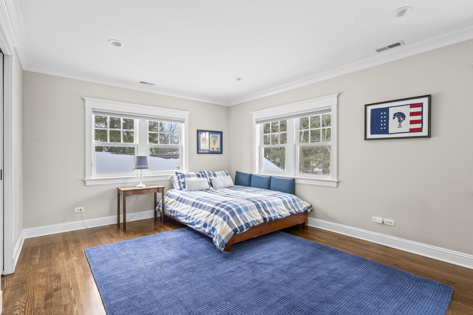 140 Birch Street Winnetka, IL 60093 - Photo 53 of 78 a bedroom with a bed and a table in it