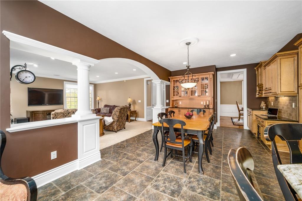 248 Hespenheide Road Mars, PA 16046 - Photo 14 of 25 a dining room with wooden floor and furniture