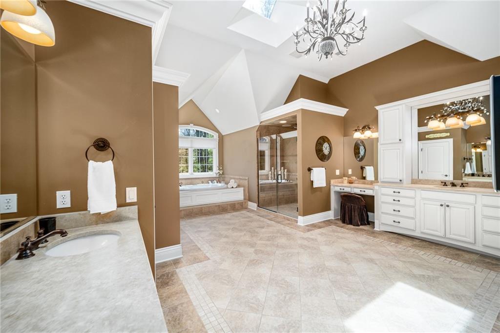 248 Hespenheide Road Mars, PA 16046 - Photo 18 of 25 a large white kitchen with a large window and stainless steel appliances