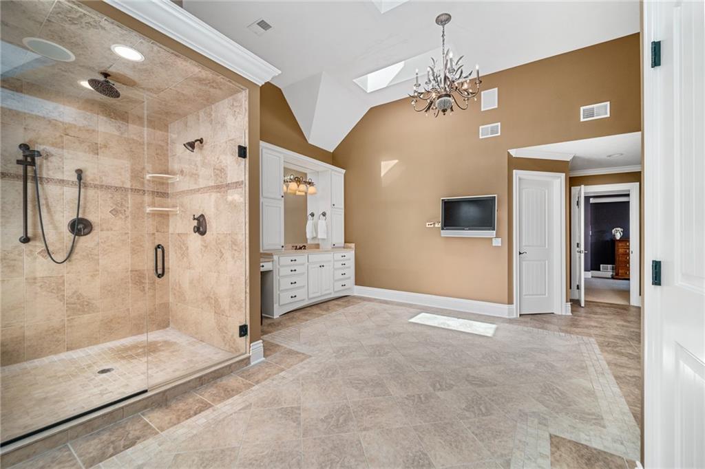 248 Hespenheide Road Mars, PA 16046 - Photo 19 of 25 a view of a hallway with a chandelier fan and windows