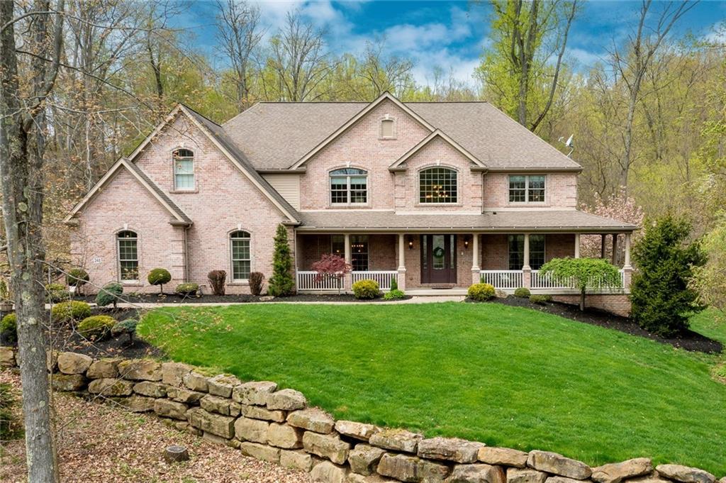 248 Hespenheide Road Mars, PA 16046 - Photo 2 of 25 a view of house with garden and tall trees