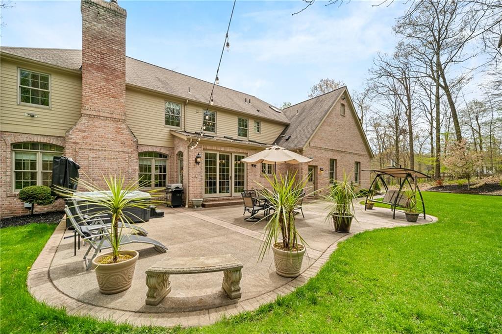 248 Hespenheide Road Mars, PA 16046 - Photo 5 of 25 a view of a house with backyard water fountain and sitting area