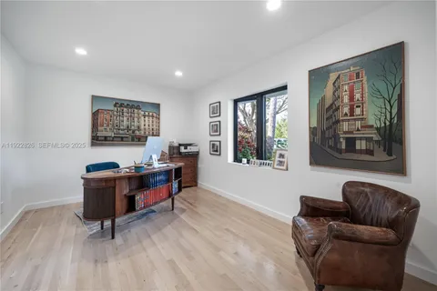 a living room with furniture and windows