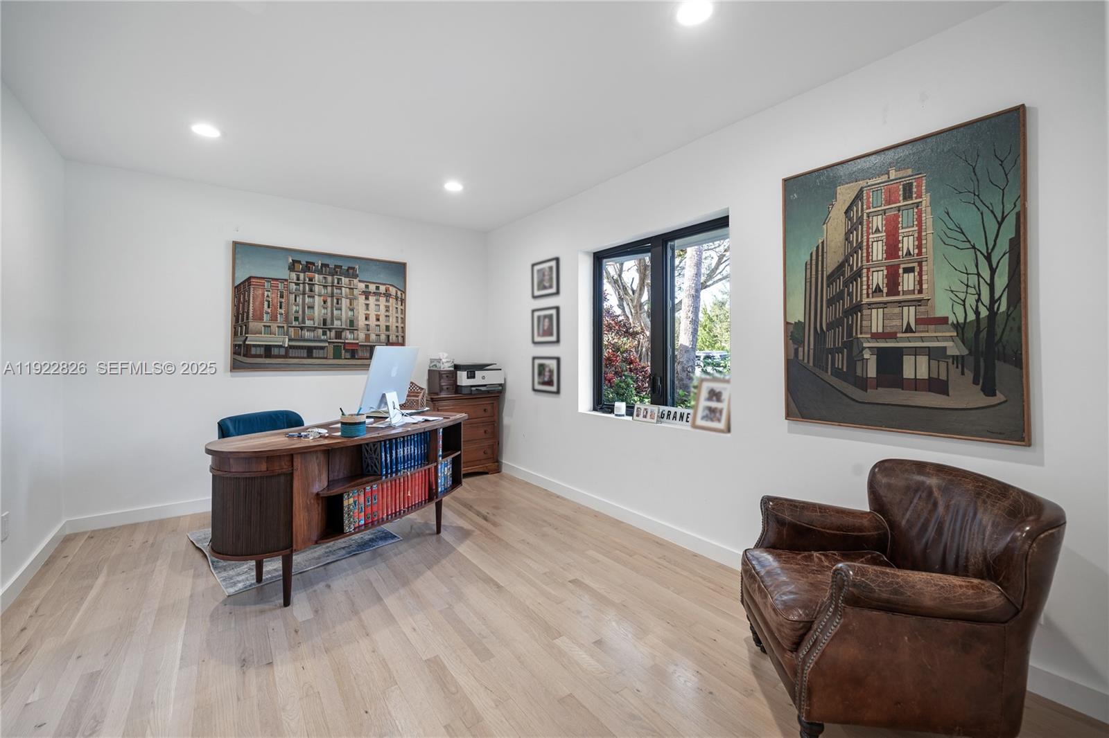 7220 Southwest 107th Terrace Pinecrest, FL 33156 - Photo 18 of 24 a living room with furniture and windows