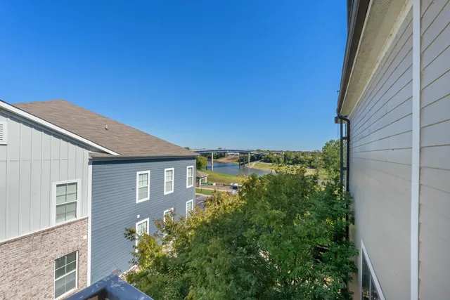 a view of a balcony with an outdoor space