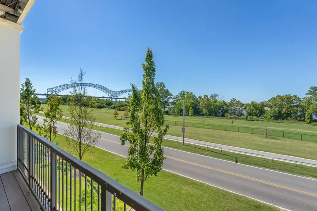 a view of a balcony with an outdoor space