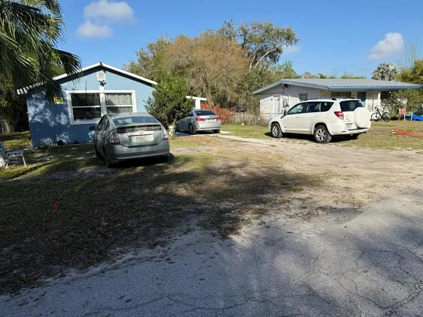 a car parked in front of a house