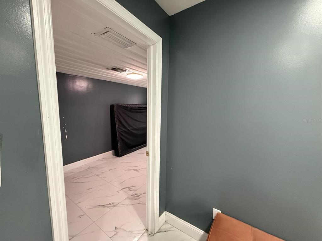 414 Spring Avenue Arcadia, FL 34266 - Photo 23 of 36 a view of wooden floor