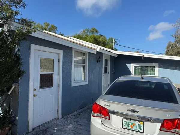 a front view of a house with yard