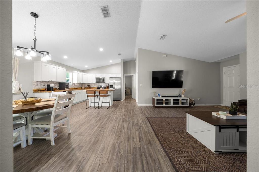 13 Teak Loop Place Ocala, FL 34472 - Photo 6 of 36 a living room with furniture and a flat screen tv