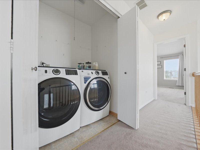 4201 Dillon Street Plano, IL 60545 - Photo 31 of 37 a utility room with dryer and washer