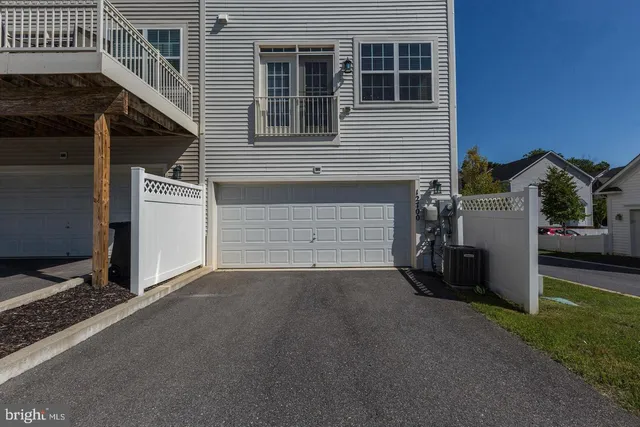 a view of a house with a garage