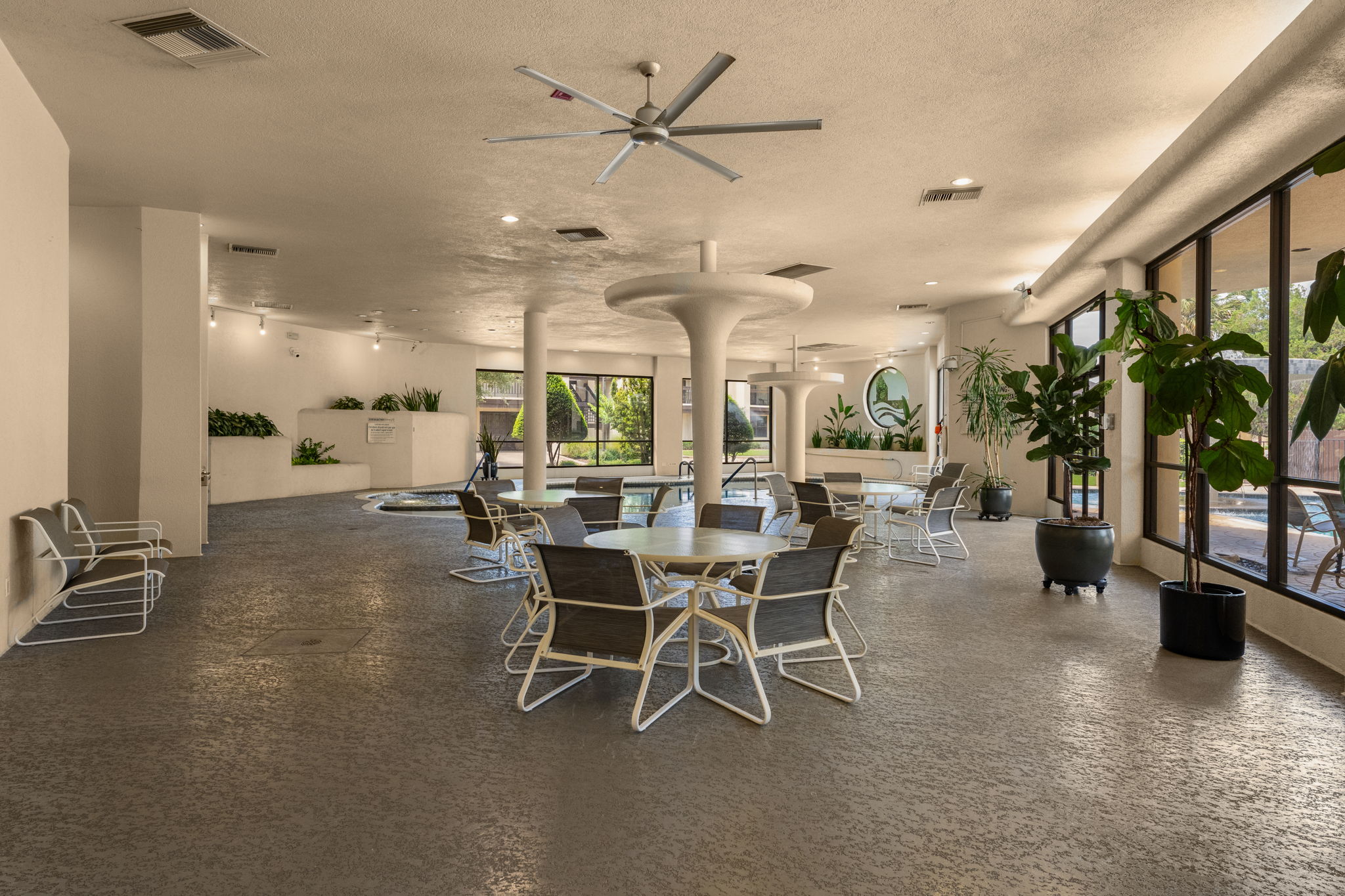40 North Interstate Highway 35, Unit 11B2 Austin, TX 78701 - Photo 22 of 28 An inviting indoor pool area offers ample seating and natural light through expansive windows.