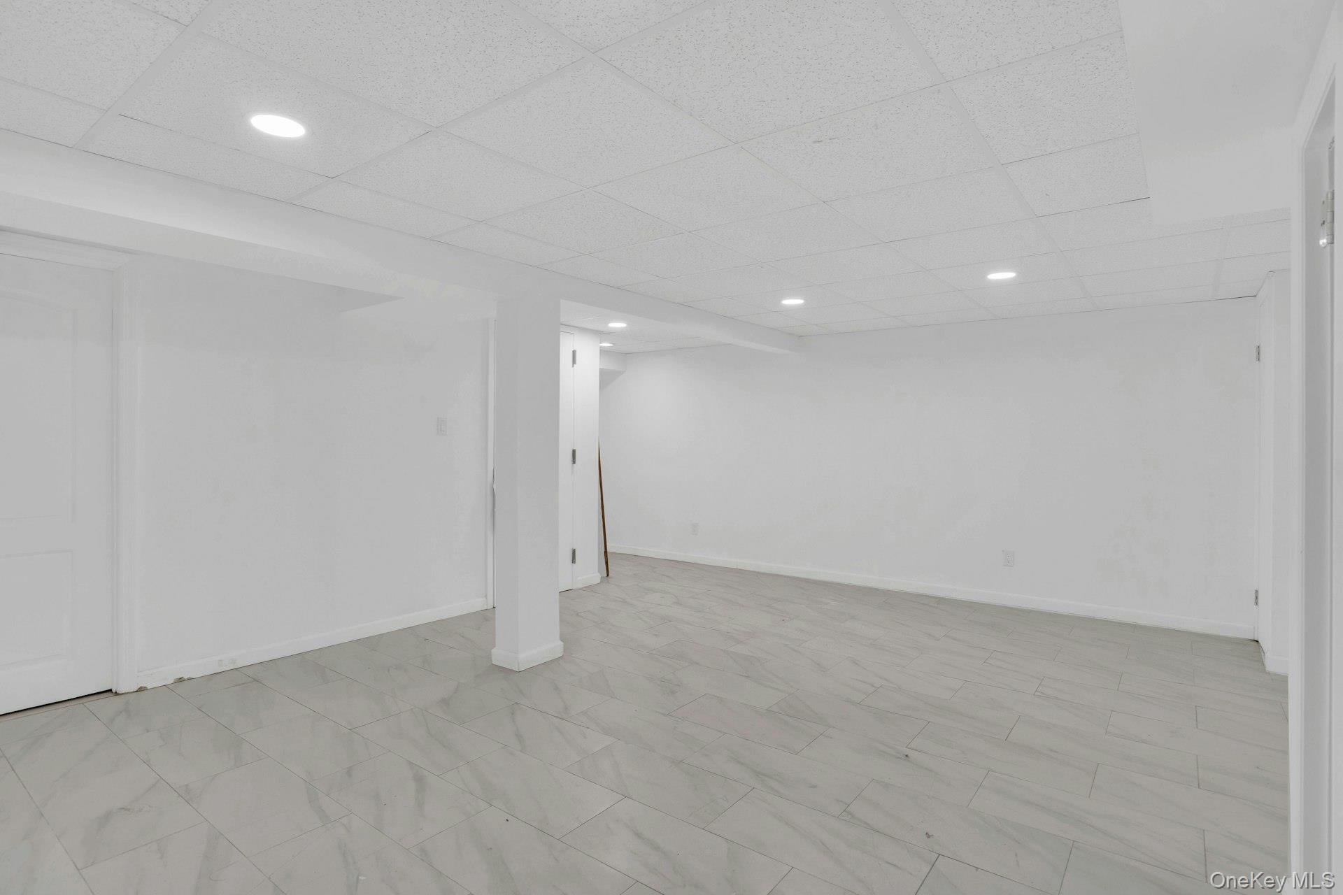 44 Delaware Avenue Commack, NY 11725 - Photo 28 of 34 a view of an empty room