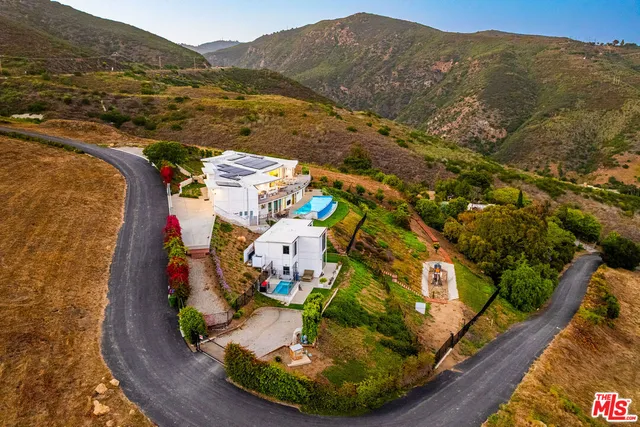 a group of people sitting in a living room