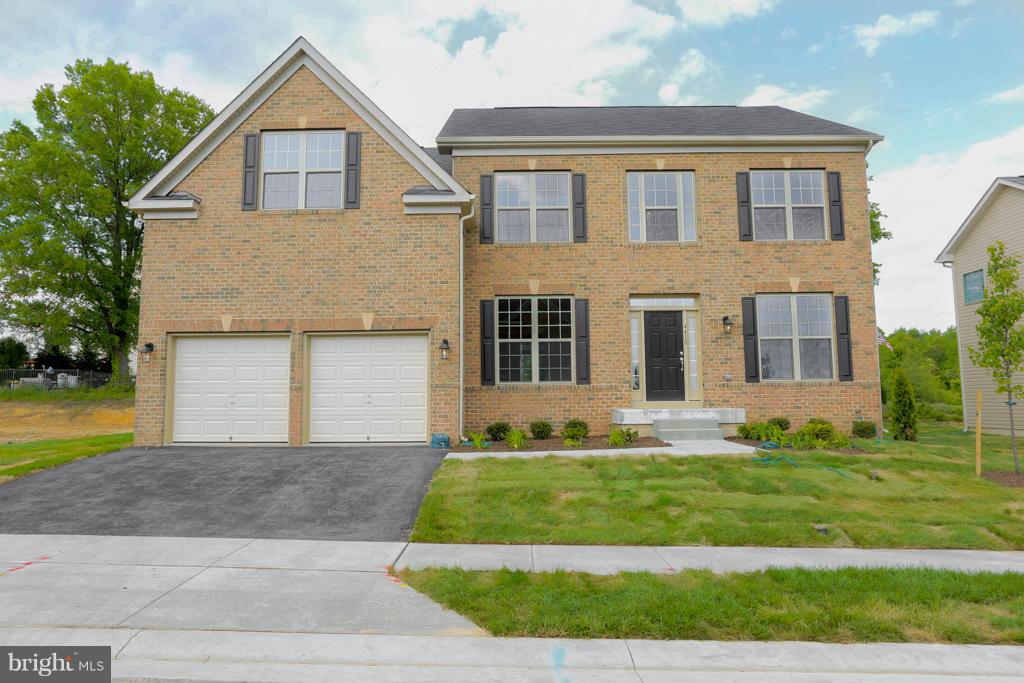 4410 Pensel Road Perry Hall, MD 21128 - Photo 1 of 30 a front view of a house with a yard and garage