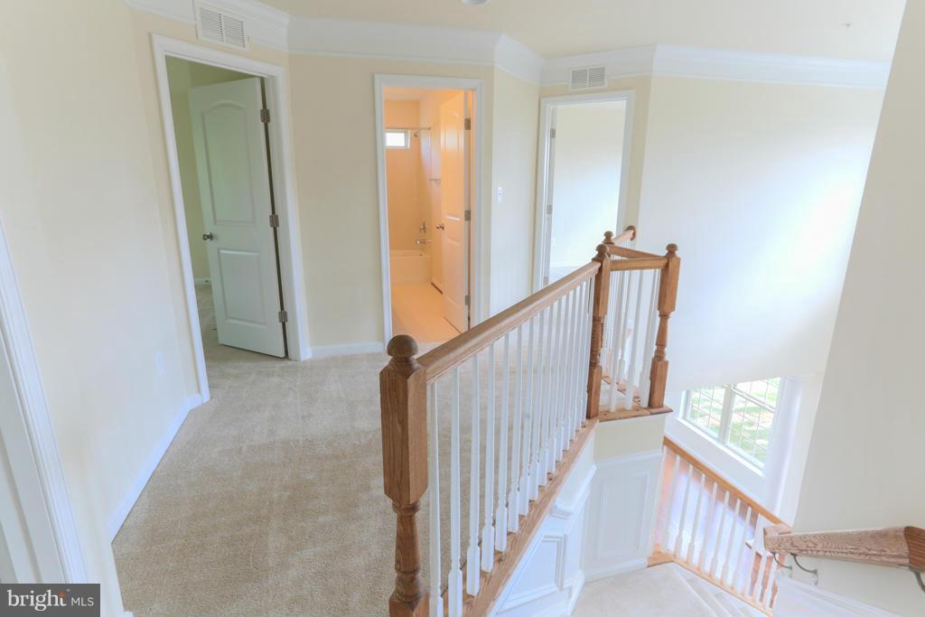 4410 Pensel Road Perry Hall, MD 21128 - Photo 14 of 30 a view of a hallway with wooden floor and entryway