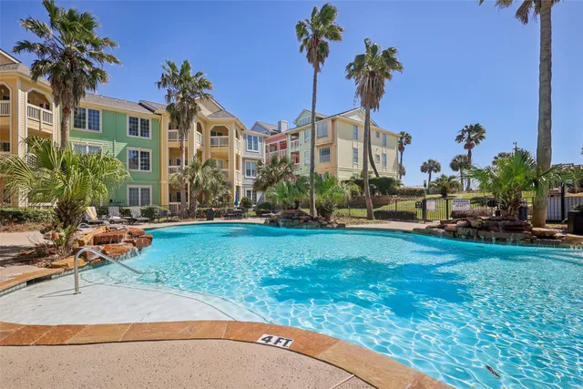 a childrens park with lots of swings and slides