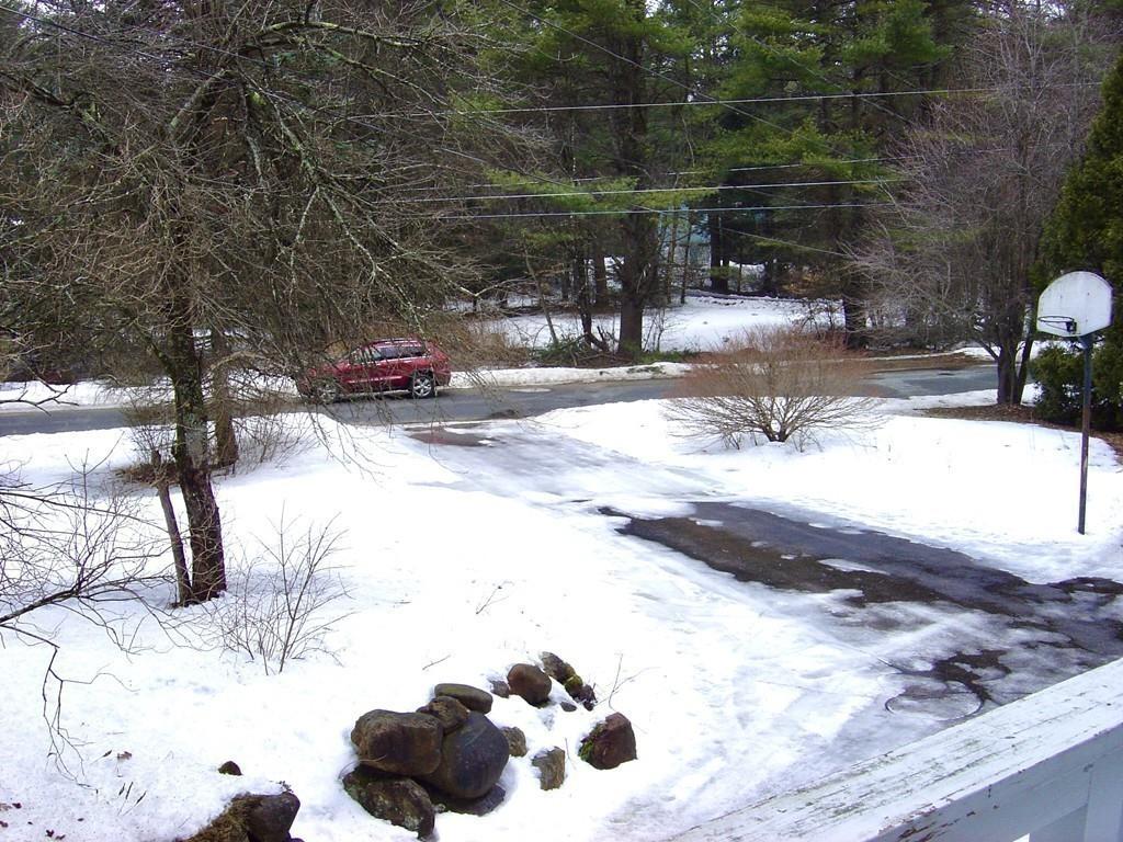 137 Eli Drive Winchendon, MA 01475 - Photo 36 of 38 a view of a street with snow on the road