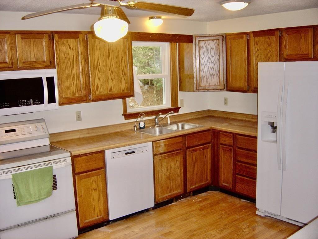 137 Eli Drive Winchendon, MA 01475 - Photo 5 of 38 a kitchen with a sink cabinets and window
