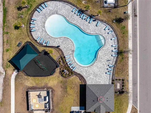 an aerial view of a swimming pool